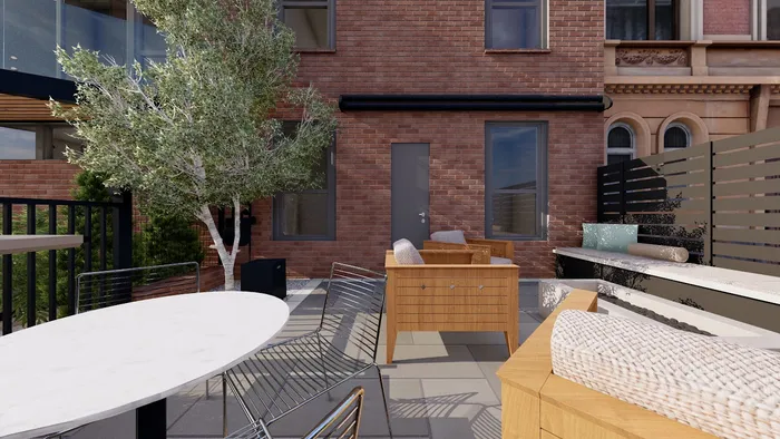 Design view of a retaining wall and integrated paver patio for a compact city lot