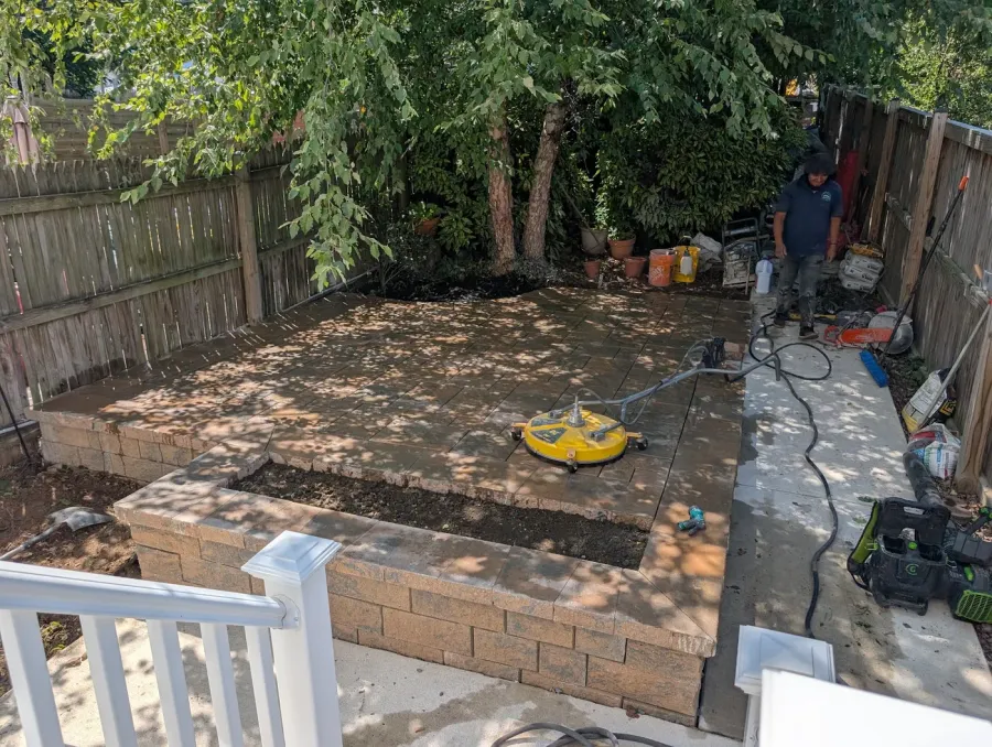 Retaining wall and paver patio nearing completion in a Southeast Washington DC backyard