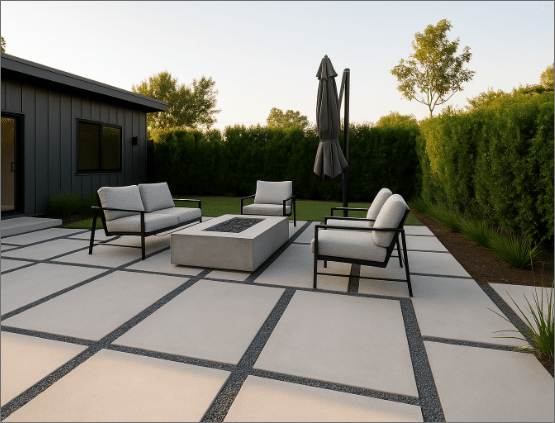 Modern minimalist patio design with concrete pavers and lounge furniture